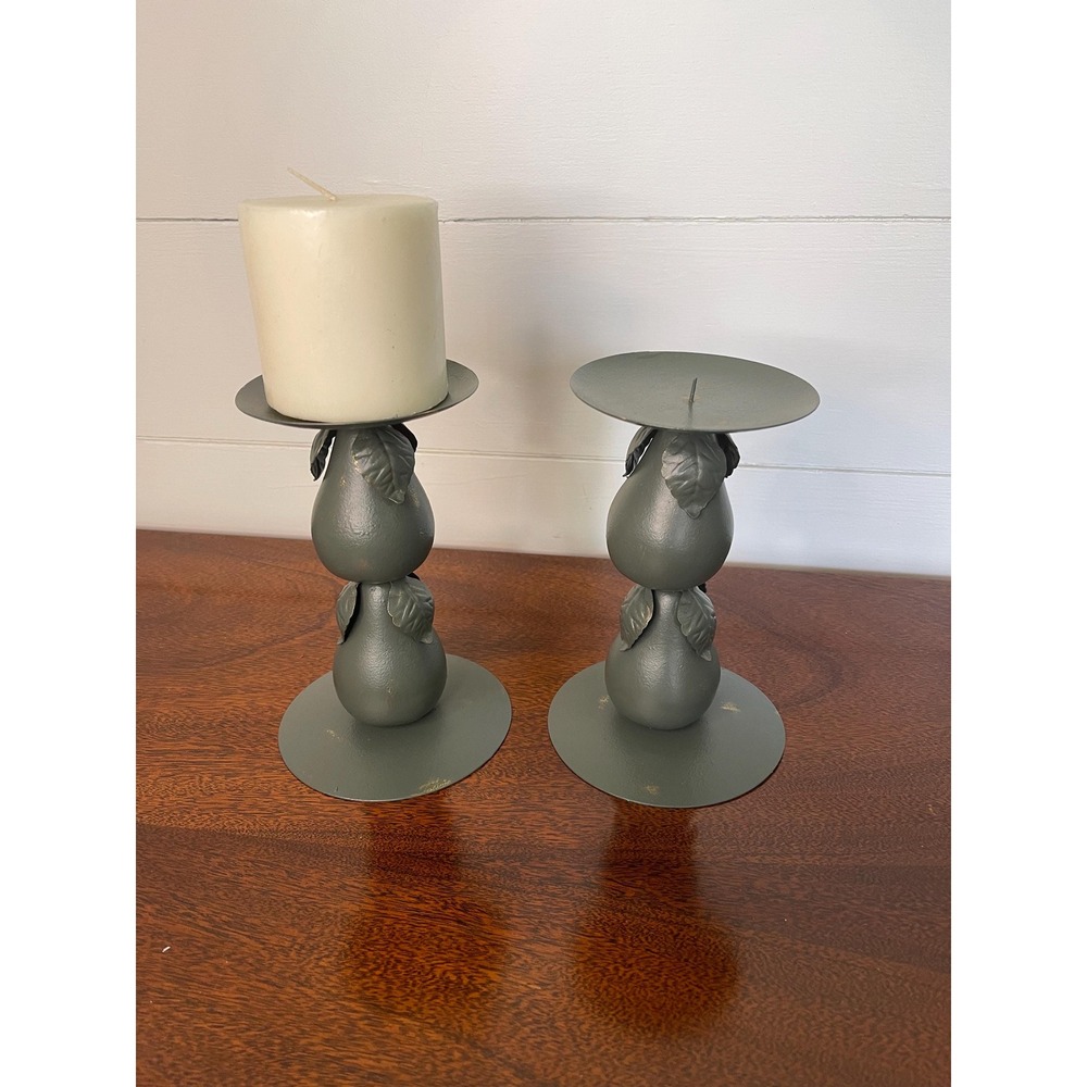 A set of candle holder dark green with pears dusted with gold